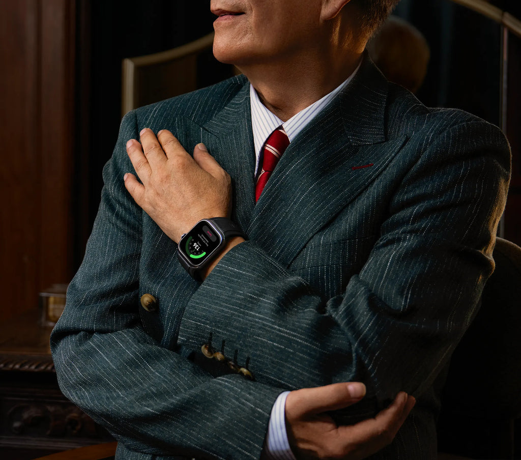 Huawei Watch D2 smartwatch worn with a business suit, elegant lifestyle look.