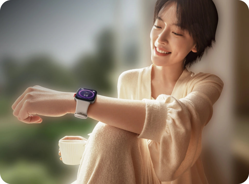 Huawei Watch Fit 3 smartwatch worn by woman indoors, lifestyle fitness use.